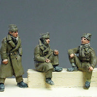 Crew in winter clothing relaxing (20mm)